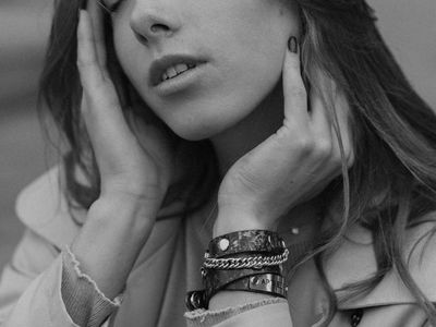 Detail shot of hands in a meditative pose