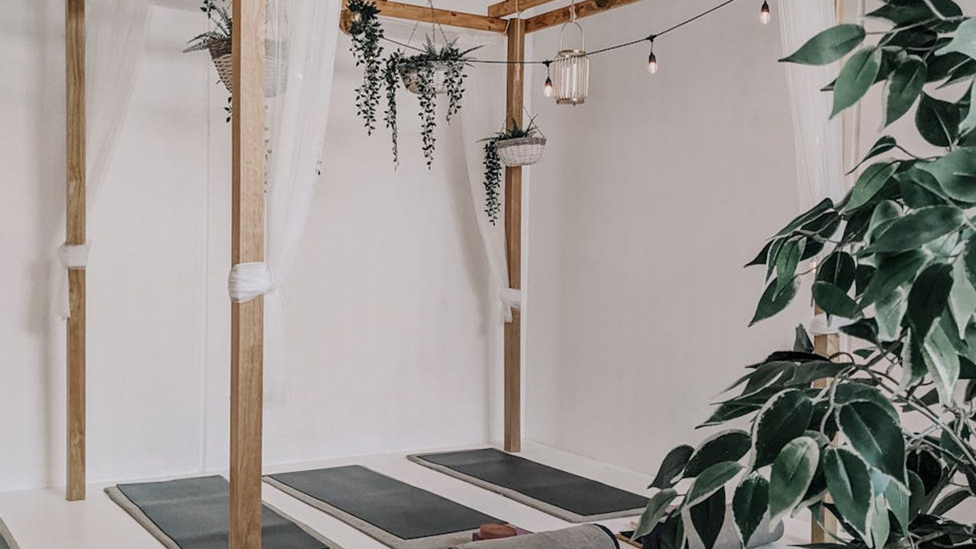 Serene morning light in a minimal yoga studio space